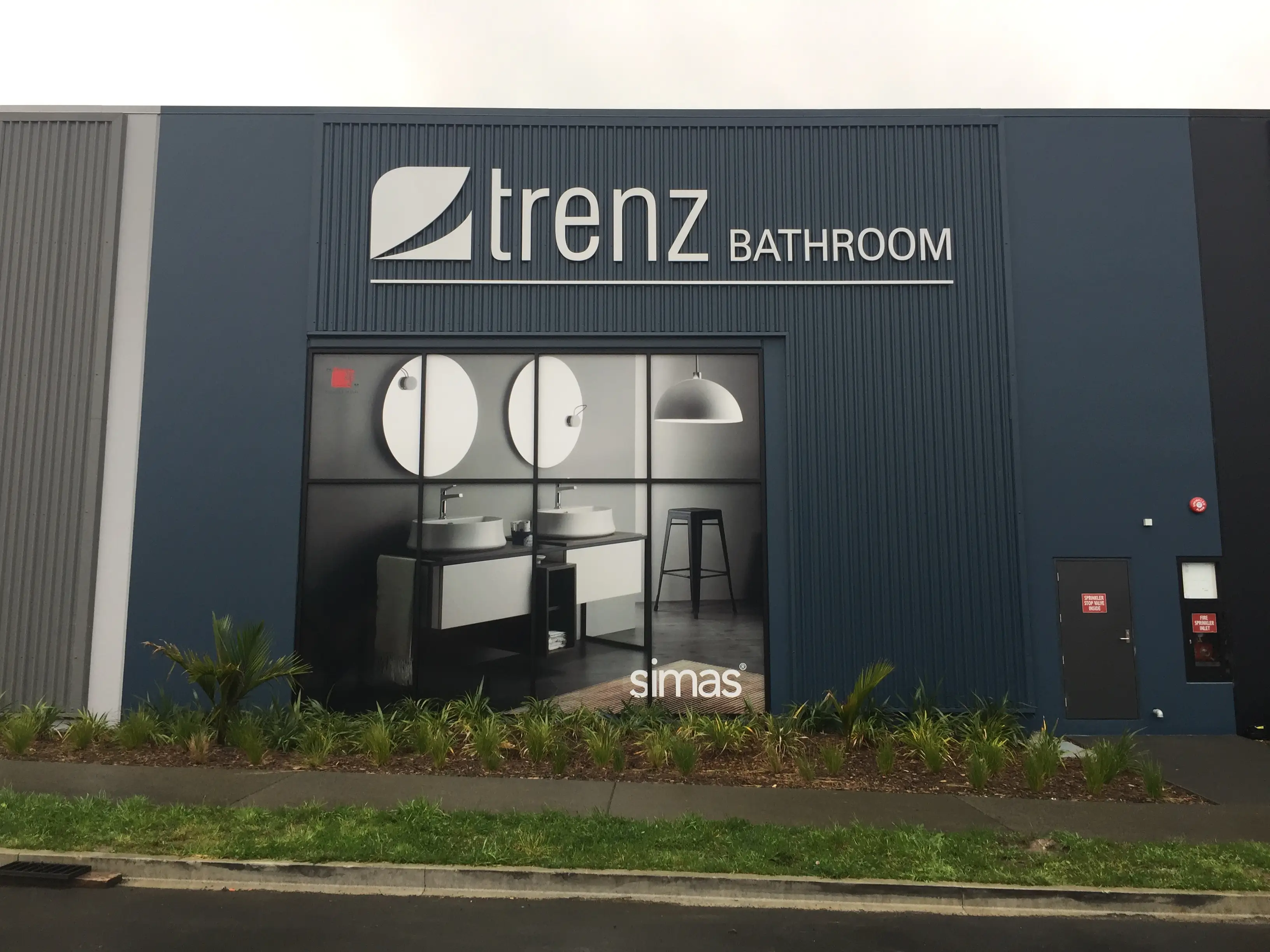 TRENZ exterior building identity and display windows.