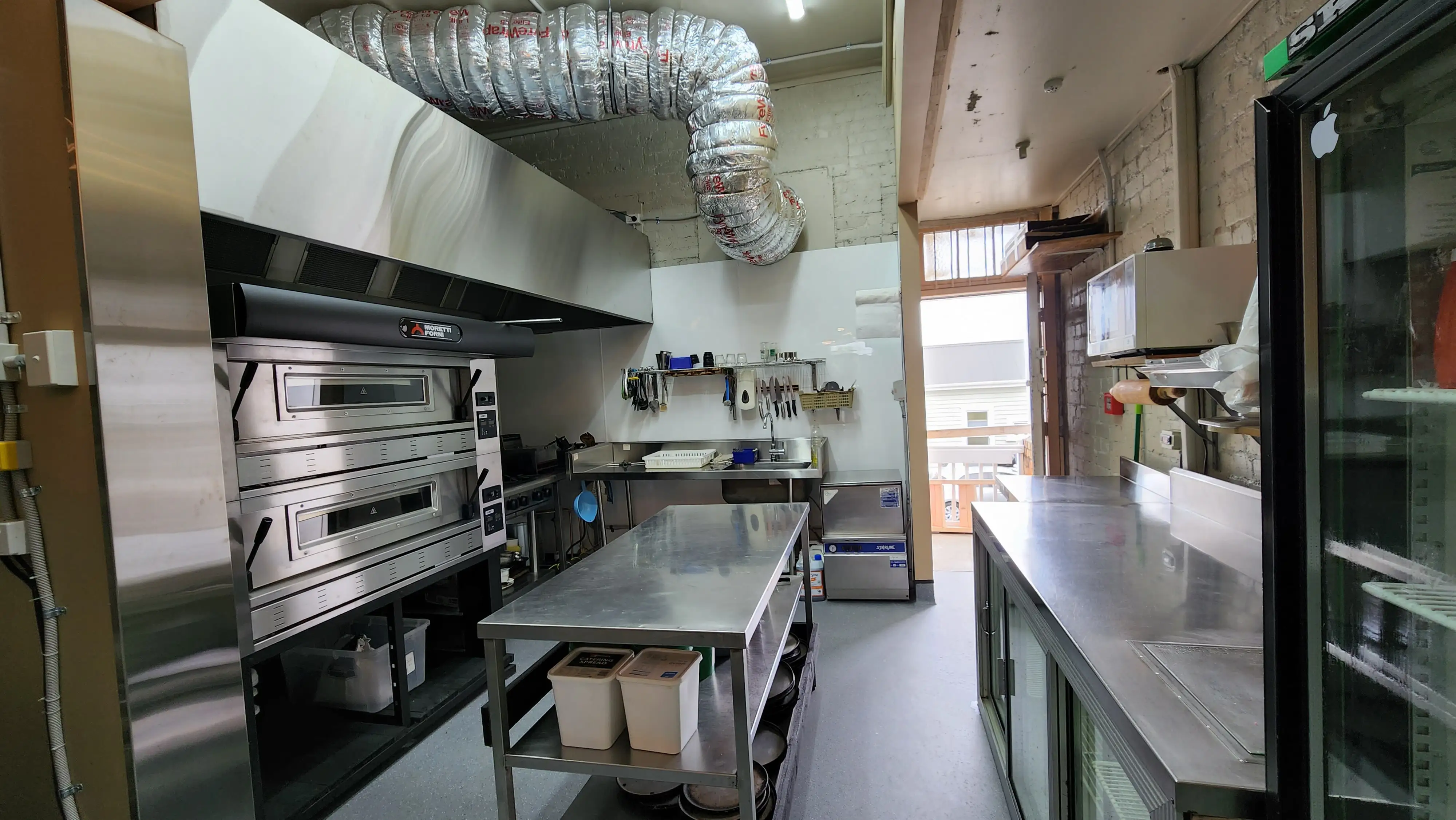 Service-counter area within the completed restaurant.