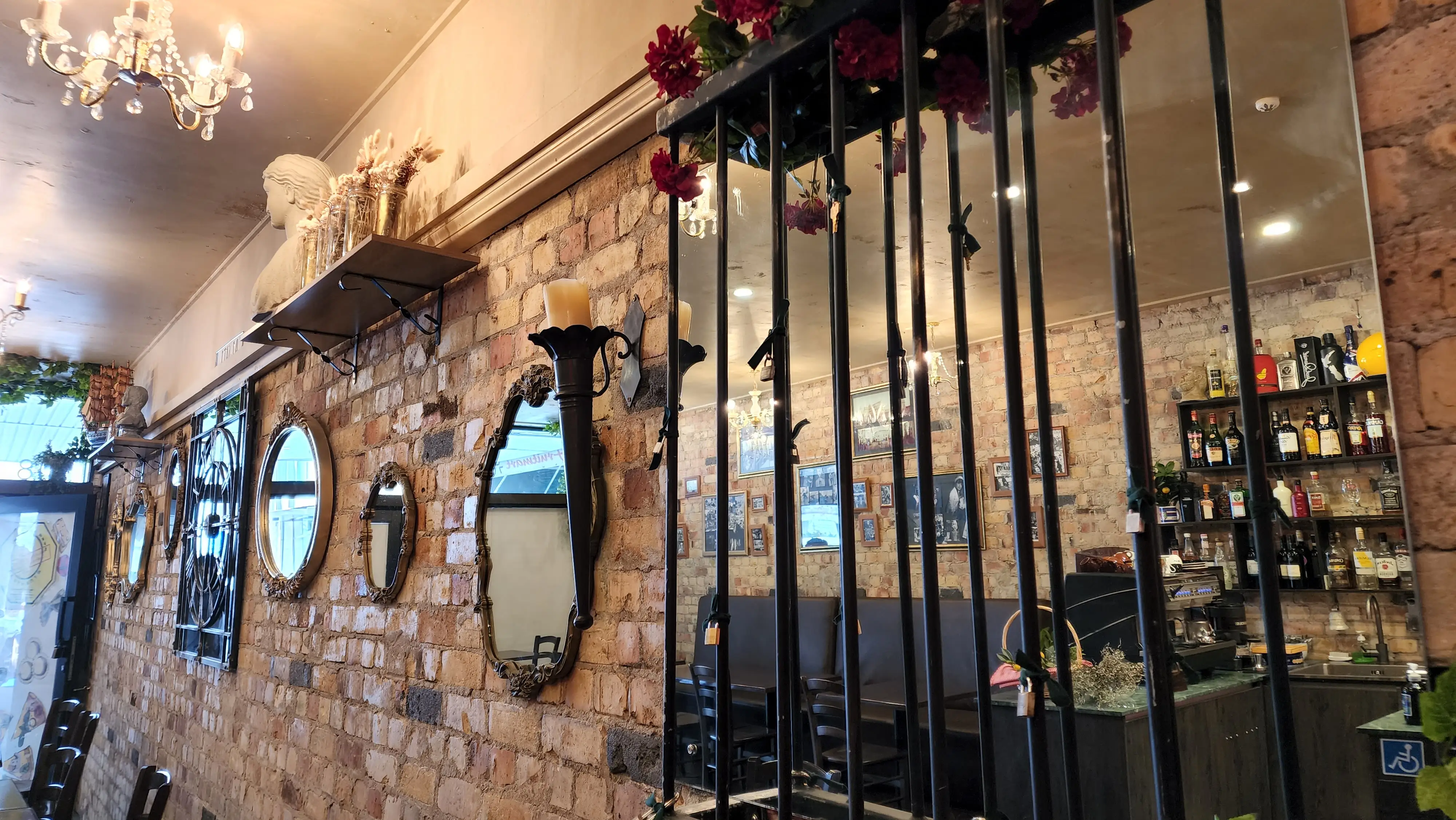 Hospitality seating, lighting and brand details.