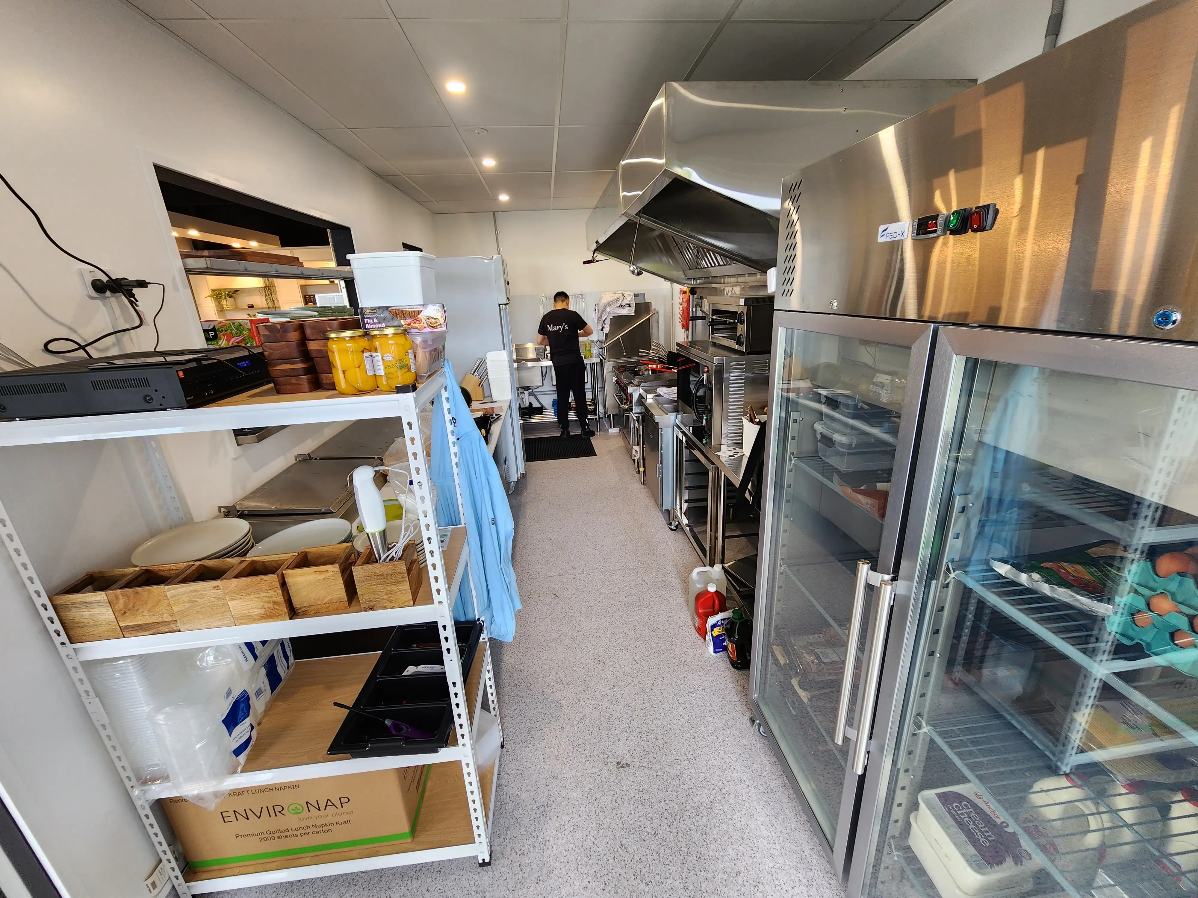 Customer and service areas within the completed café.