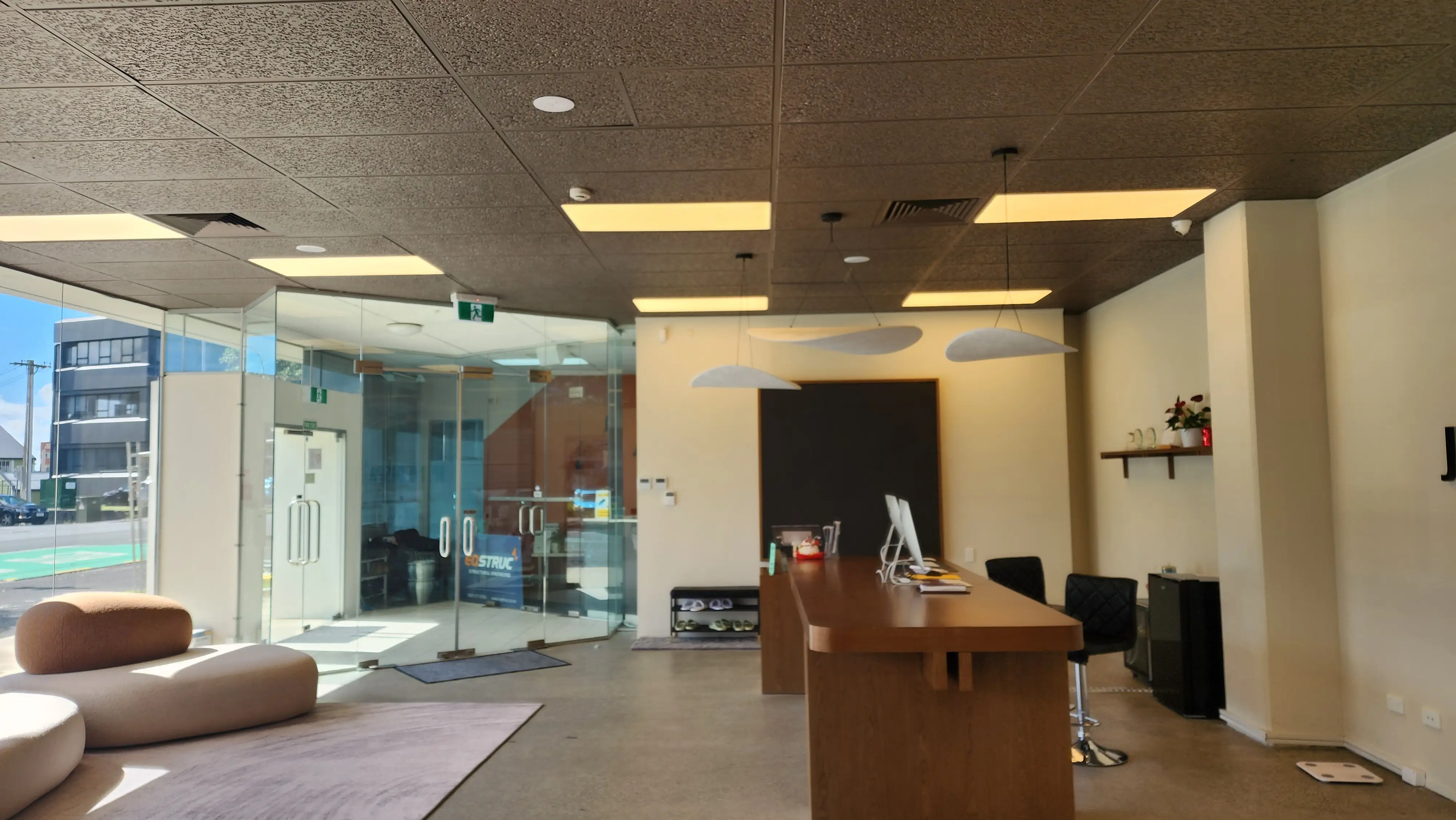 JP Medi Spa reception with recessed product displays and integrated lighting.