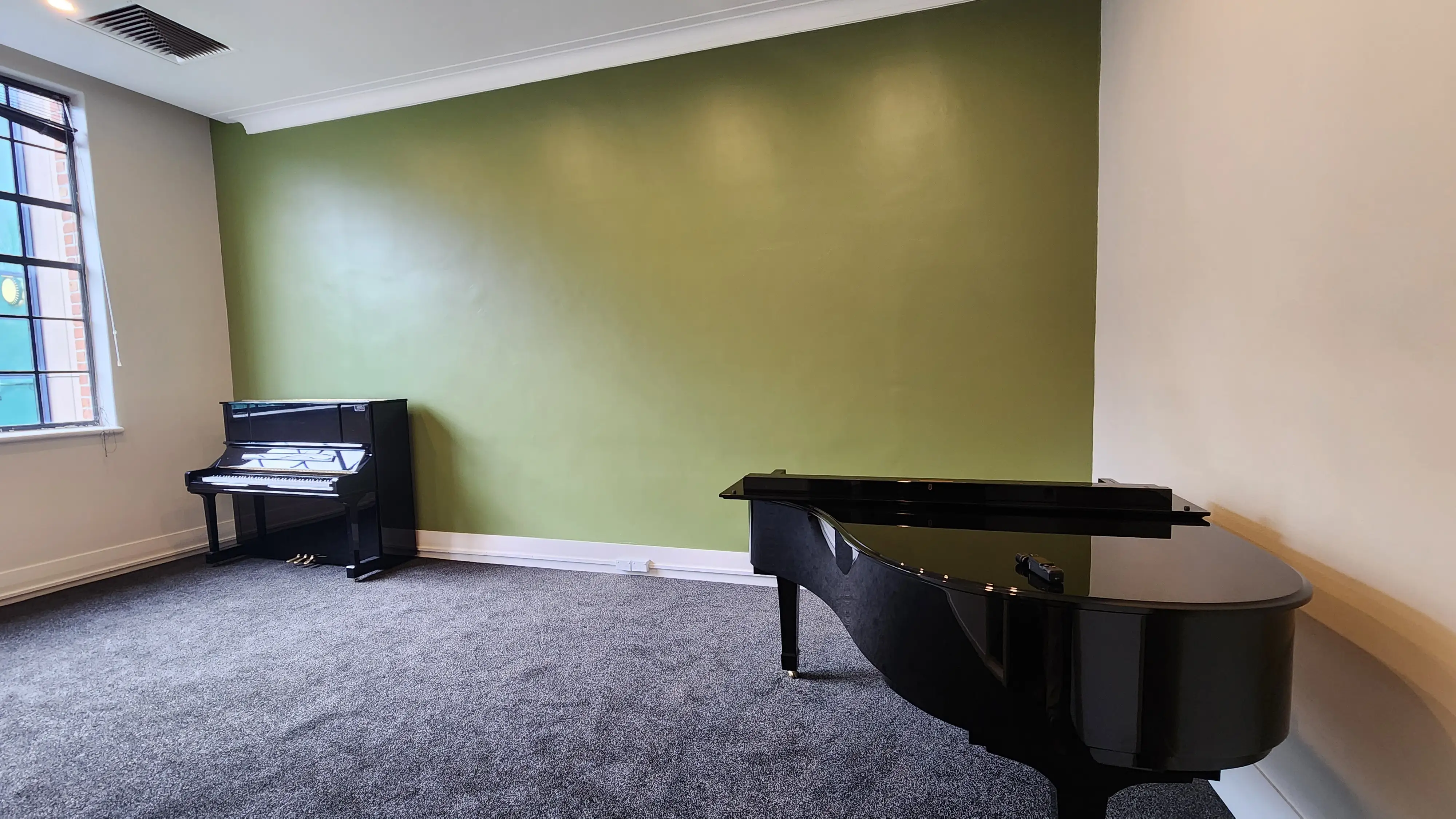 Teaching and demonstration spaces arranged around the instruments.