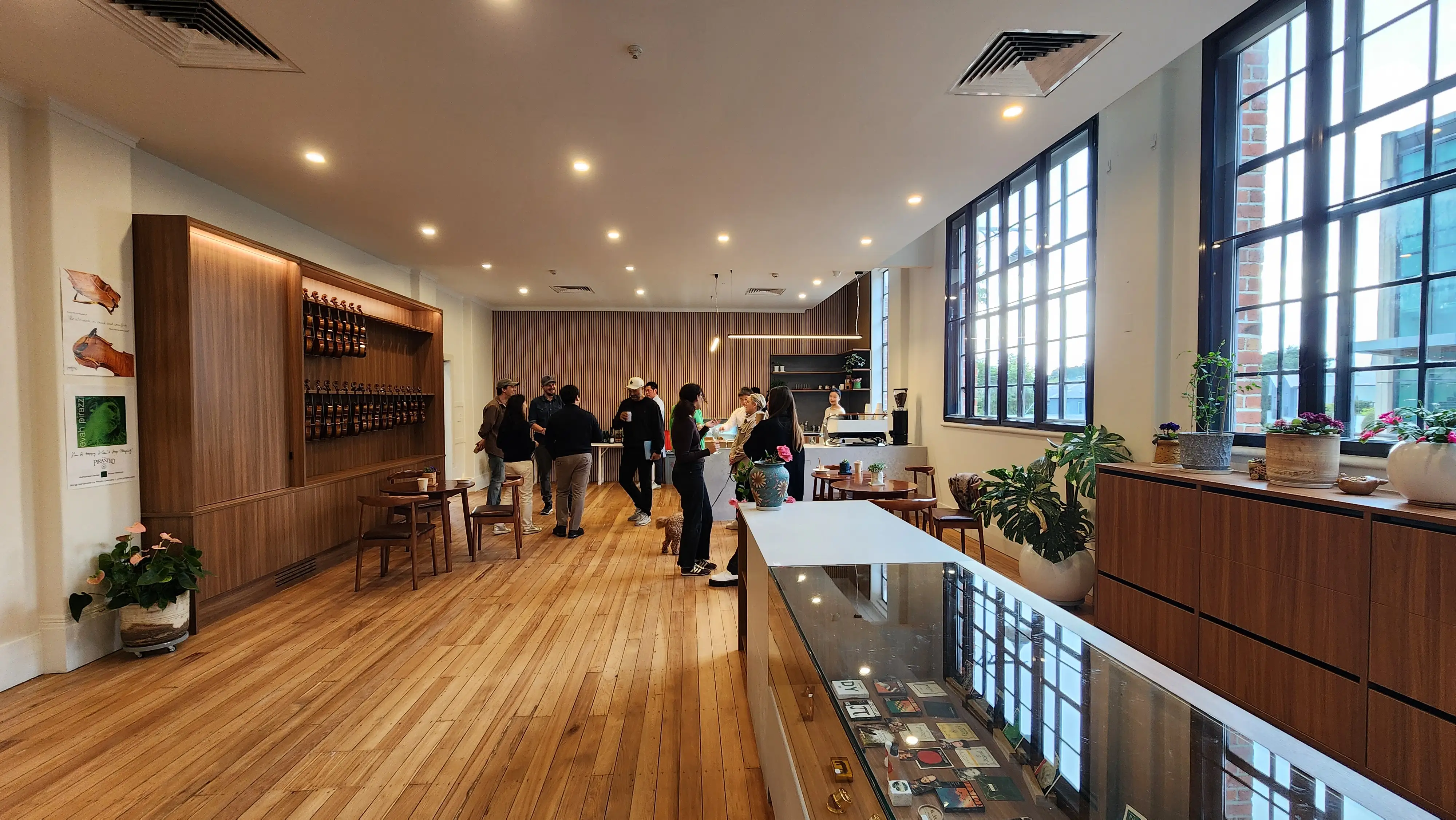 Timber-slat wall treatment within the completed music interior.