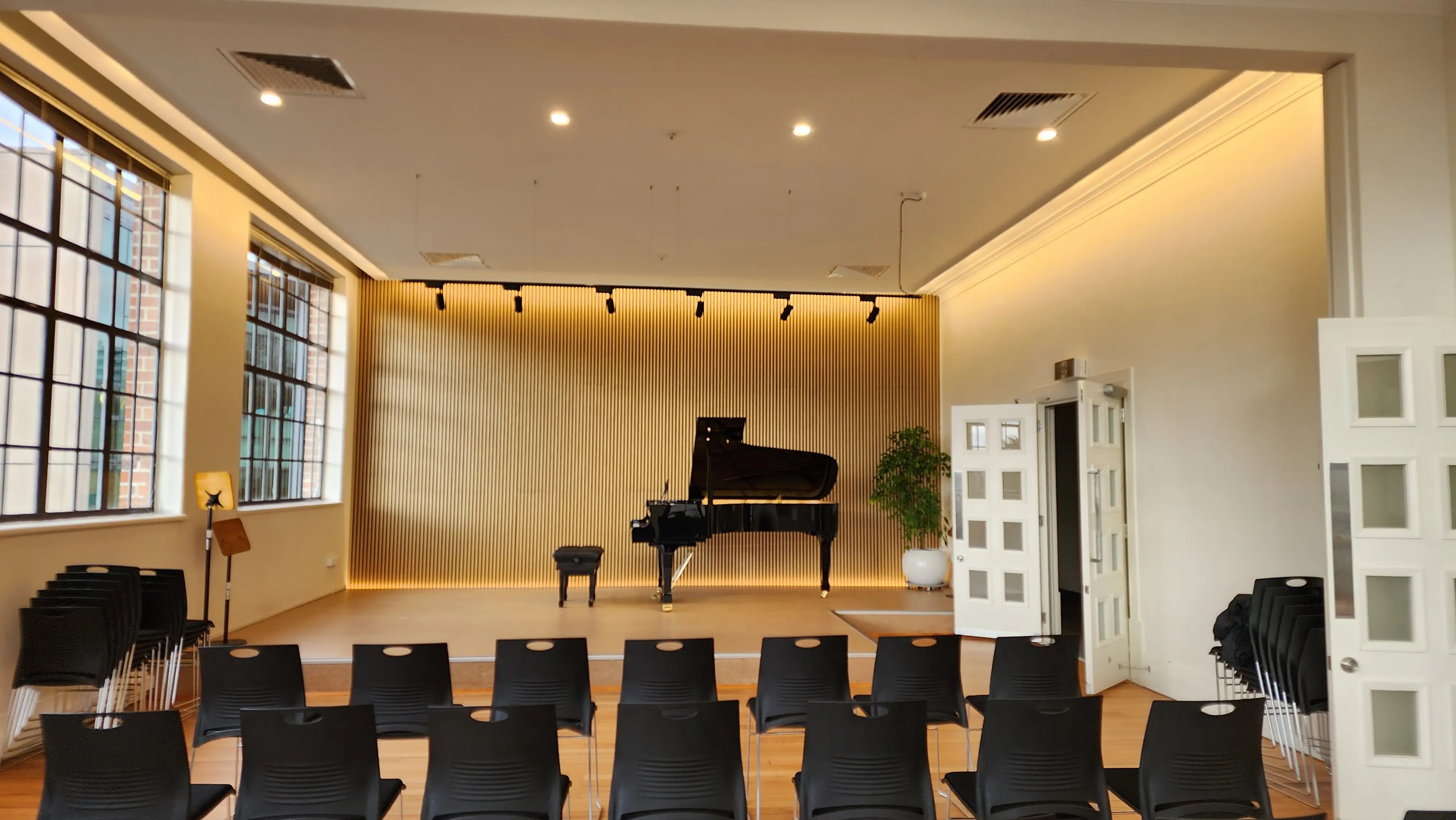 Teaching and demonstration spaces arranged around the instruments.