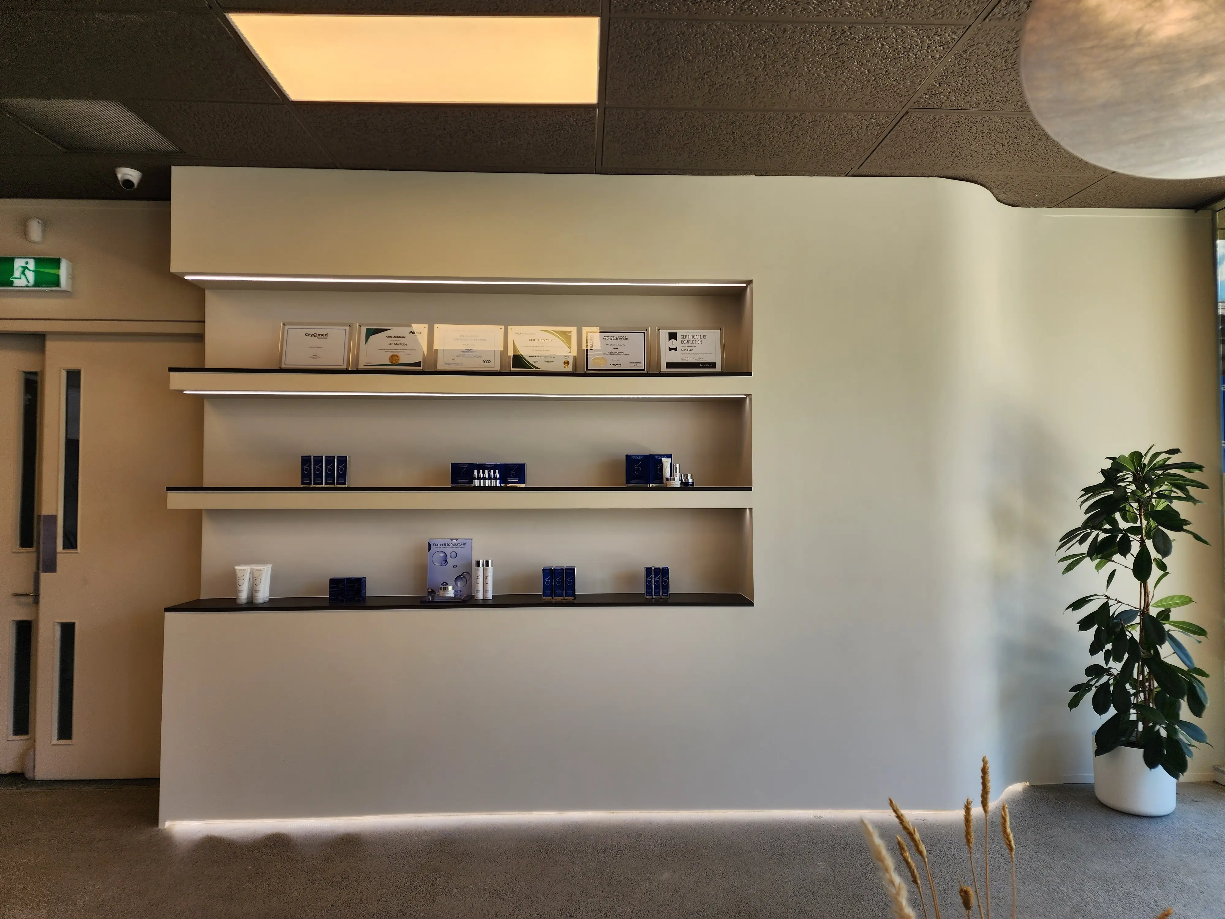 Joinery and illuminated details within the completed wellness interior.