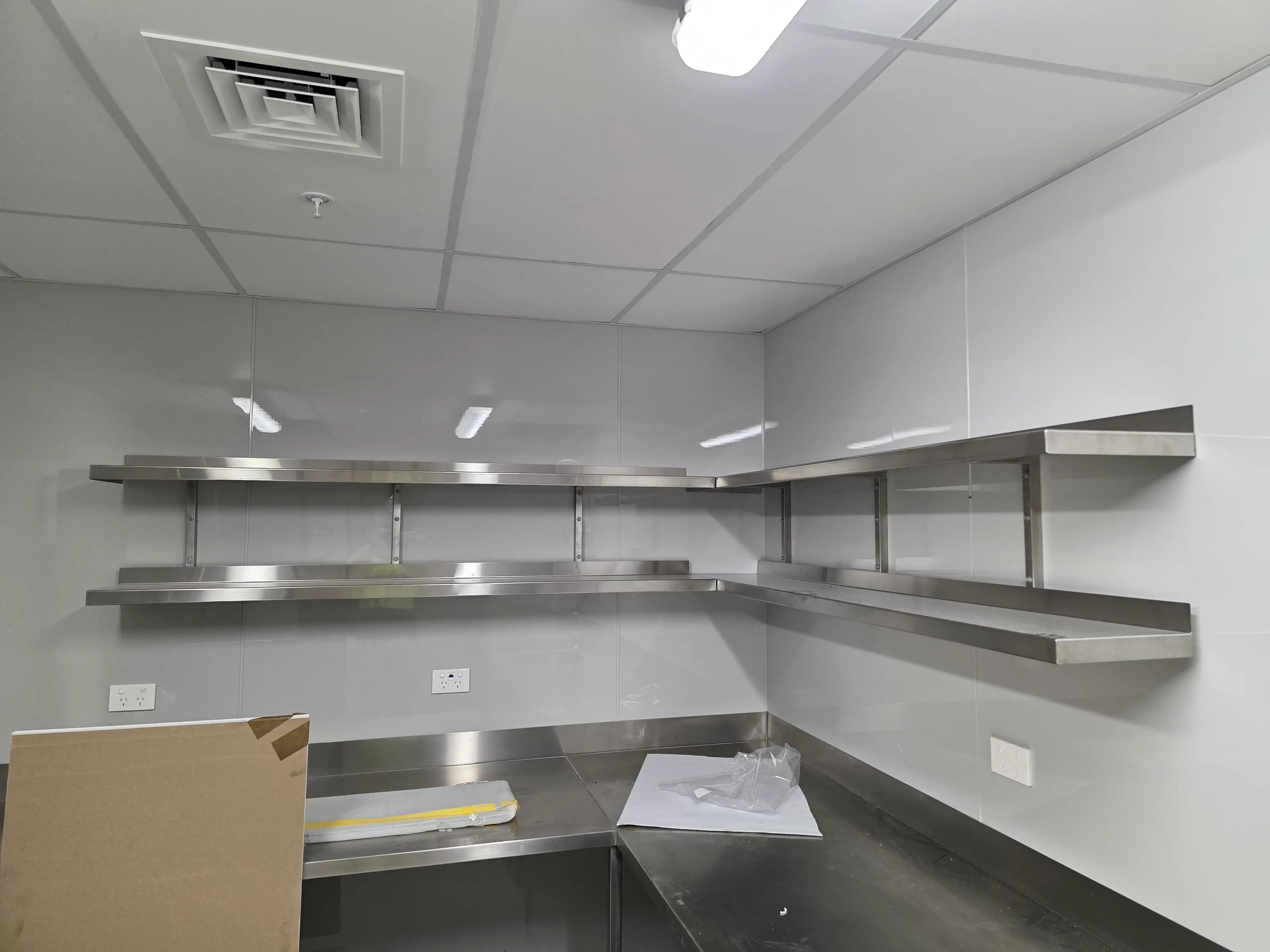 Reheat Cafe service area with timber-fronted counter joinery.