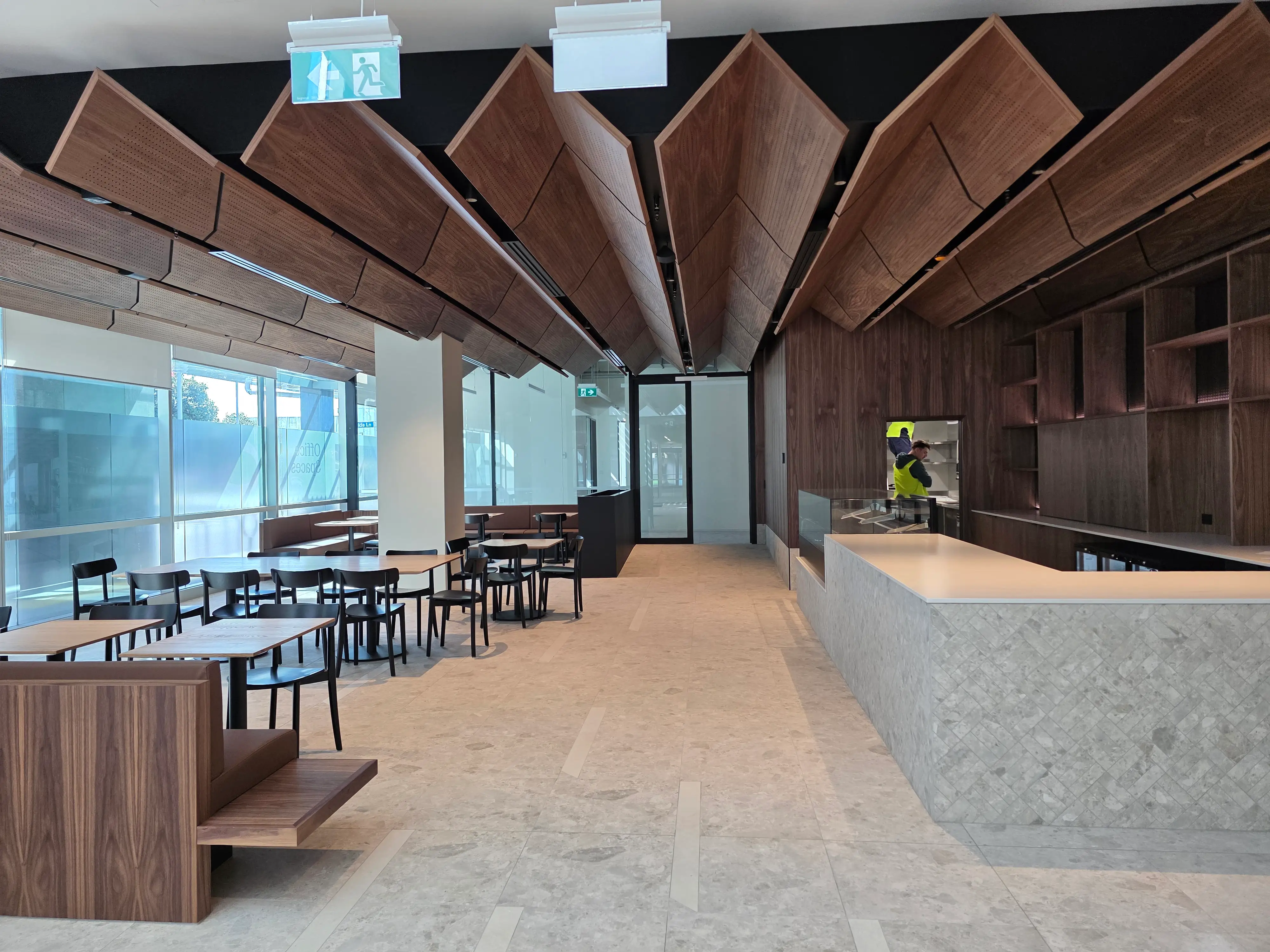 Completed café interior and operational details.