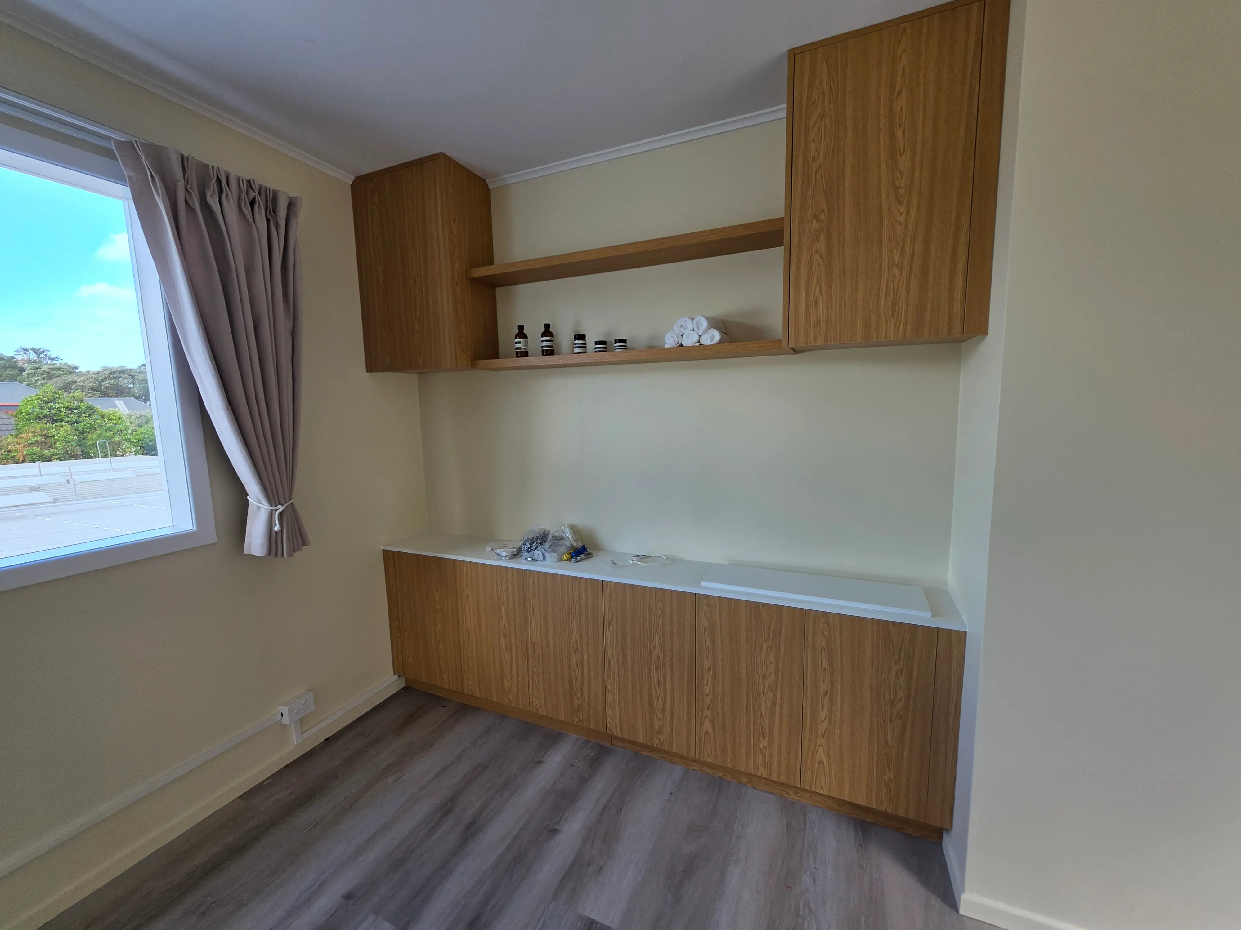 Treatment-space finishes and integrated lighting.