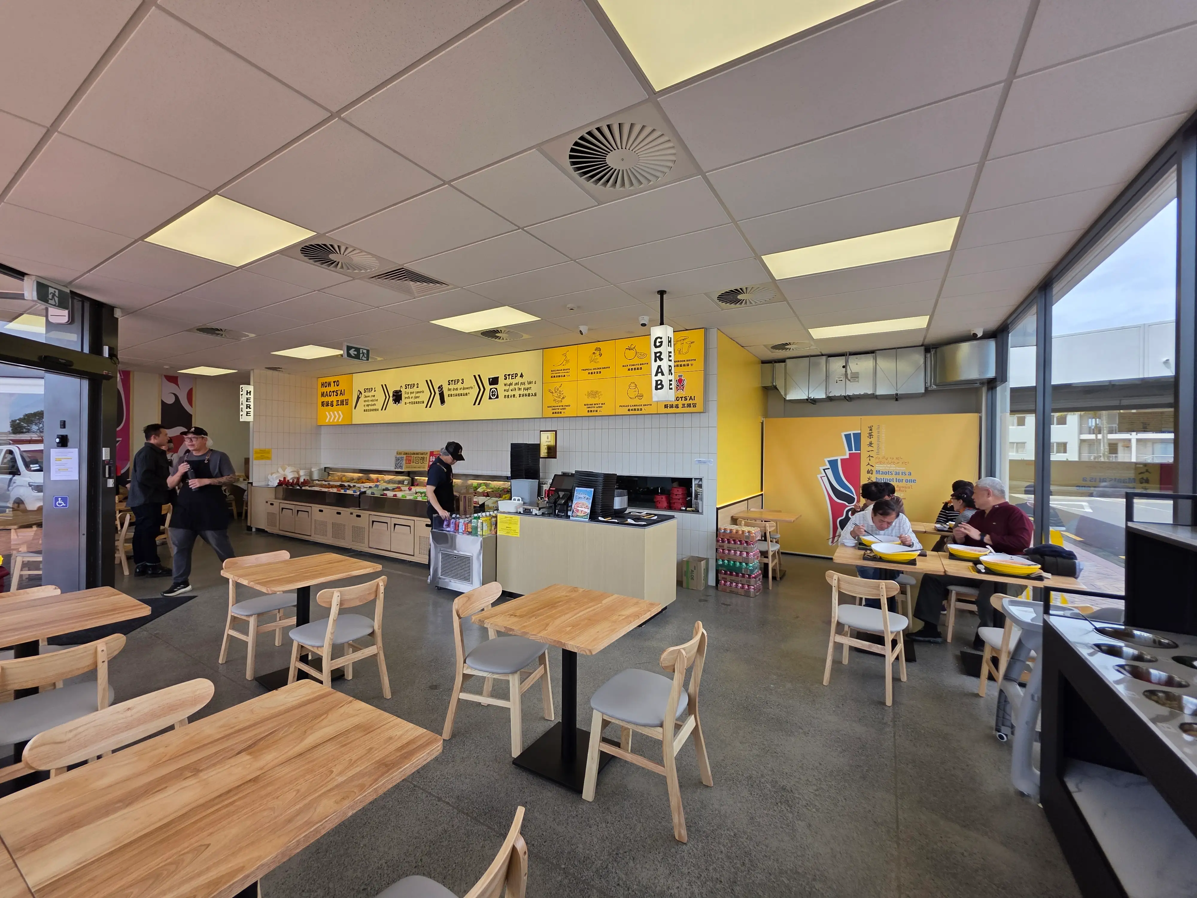 Ordering counter and kitchen interface within the restaurant.