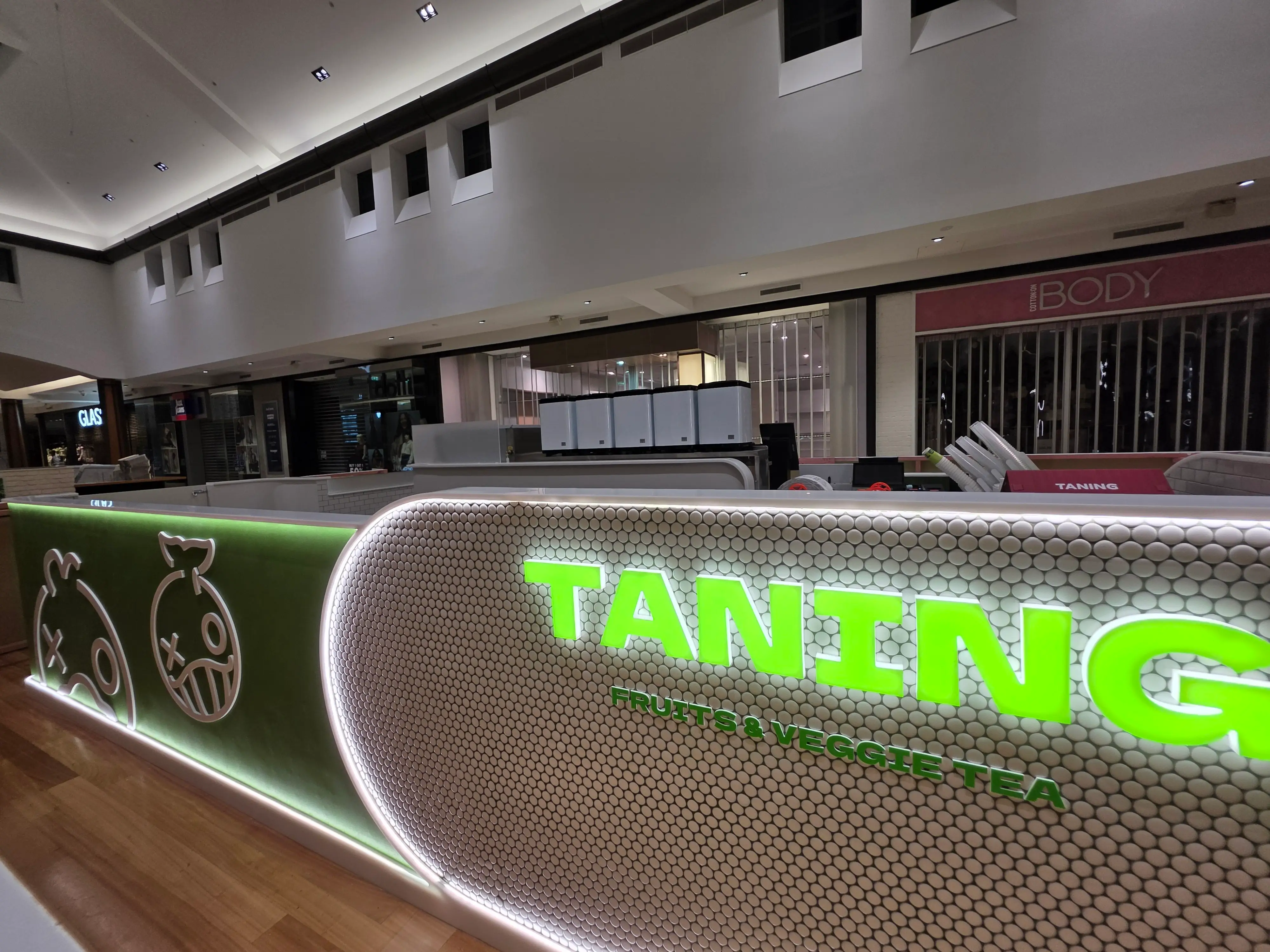 Compact reception and service joinery at Tanning Botany Town Centre.