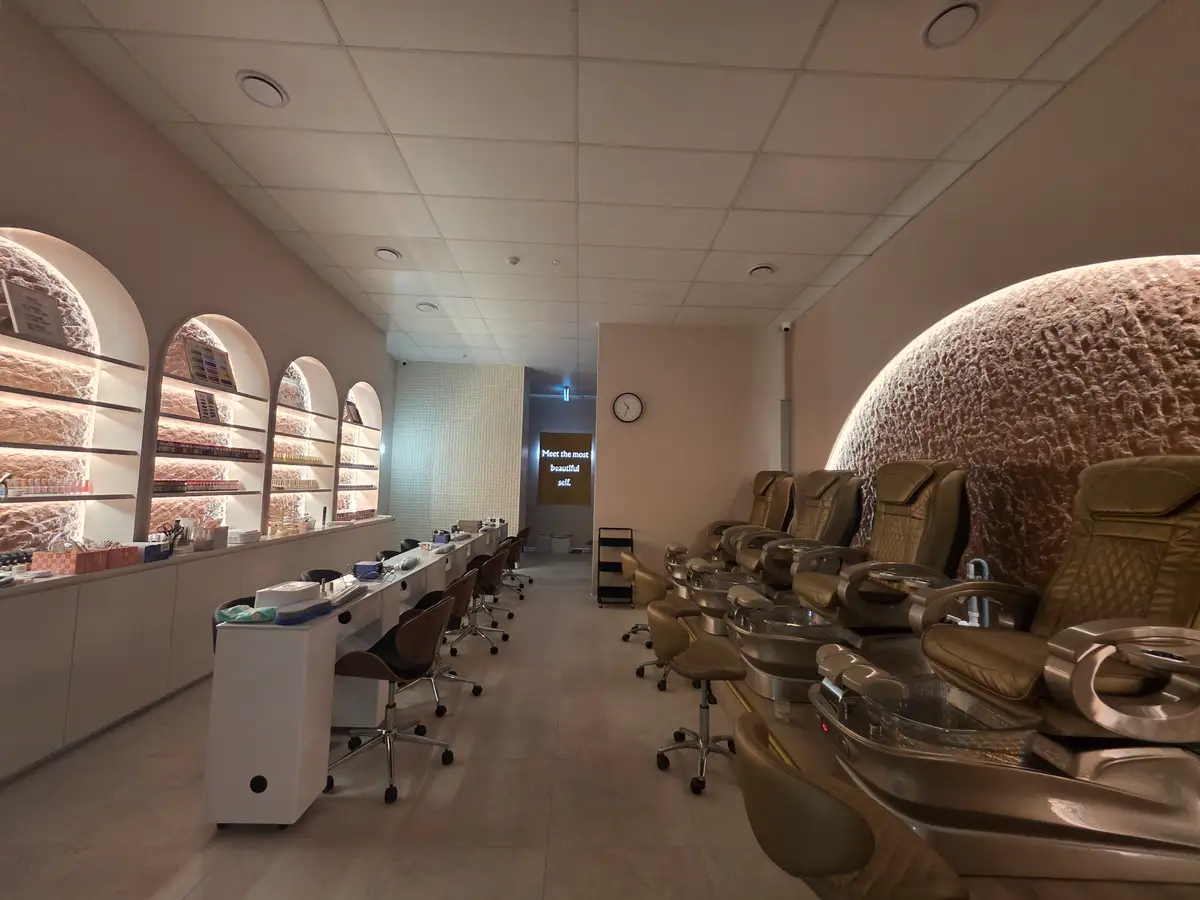 Manicure stations arranged through the completed salon.