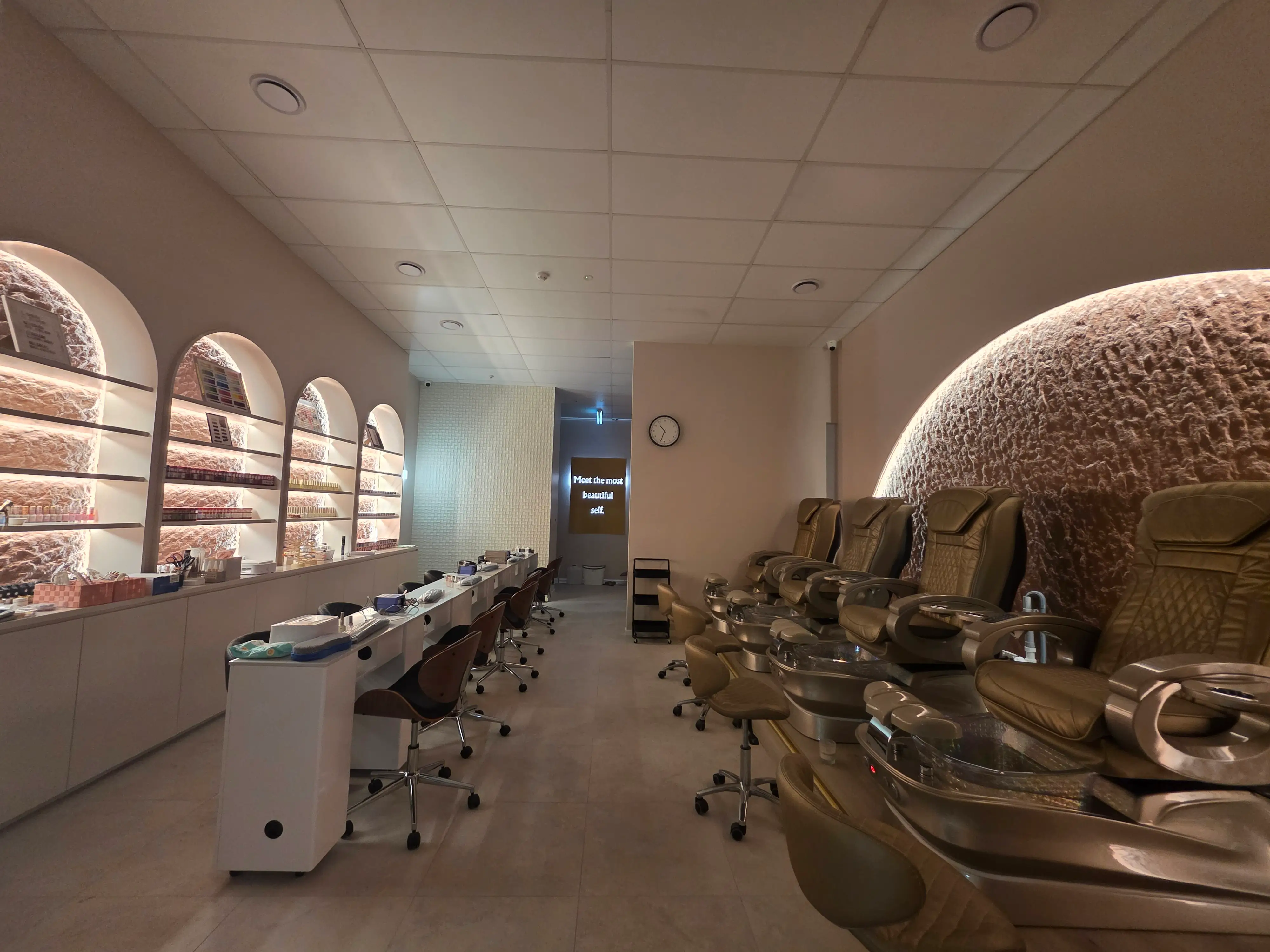 Manicure stations arranged through the completed salon.