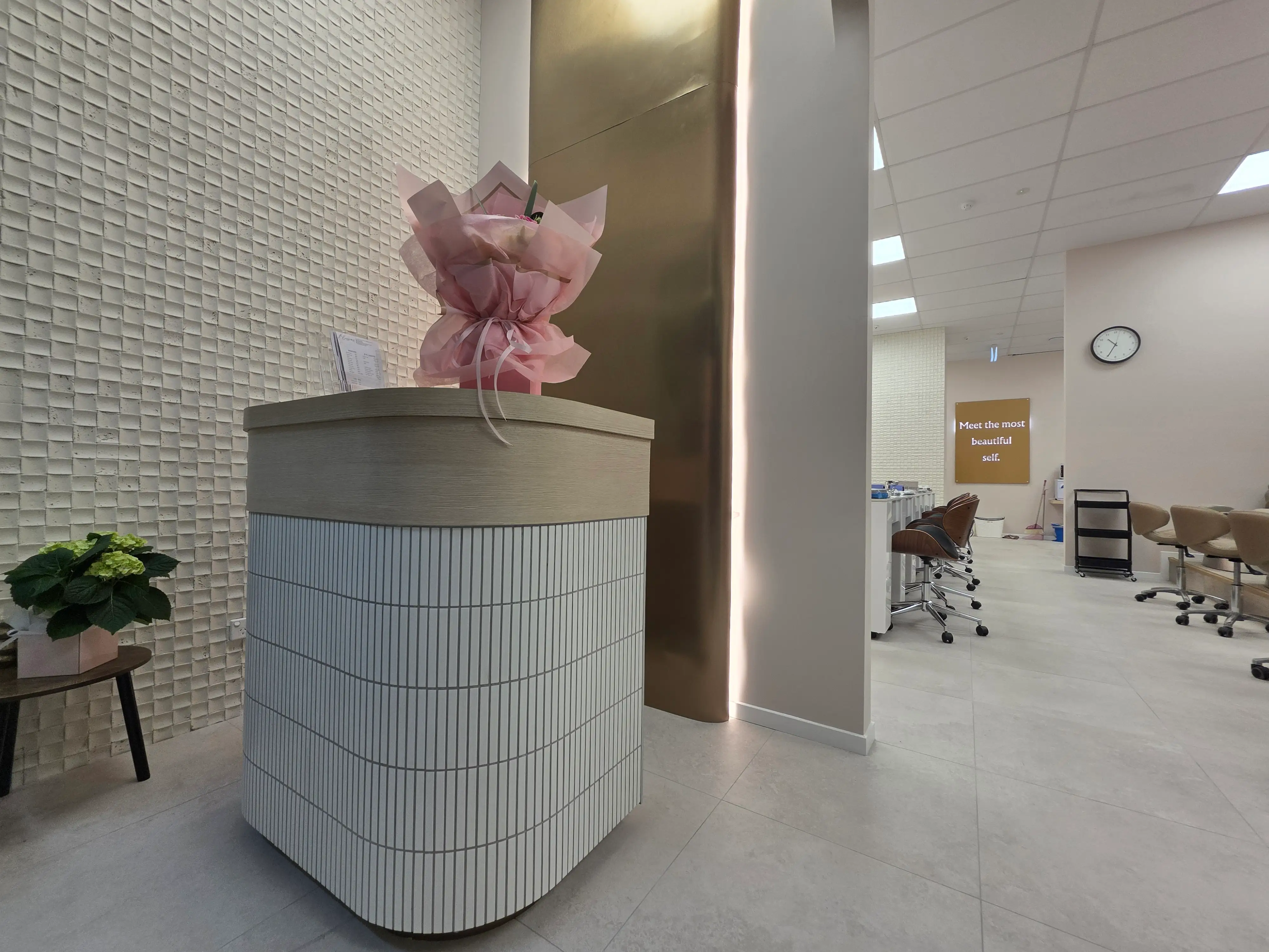 Blossoms Nails & Beauty interior with arched product-display niches.