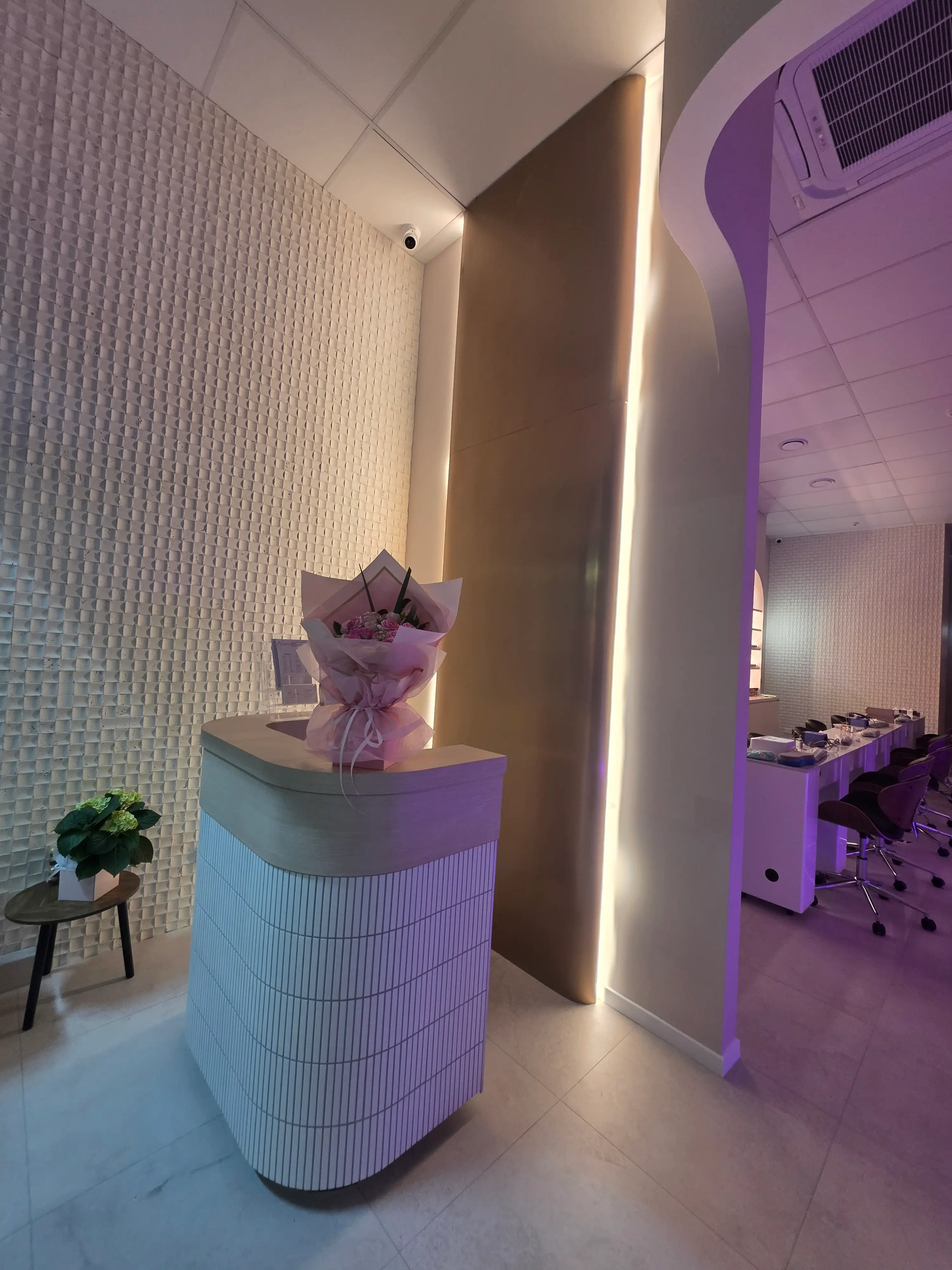 Manicure stations arranged through the completed salon.