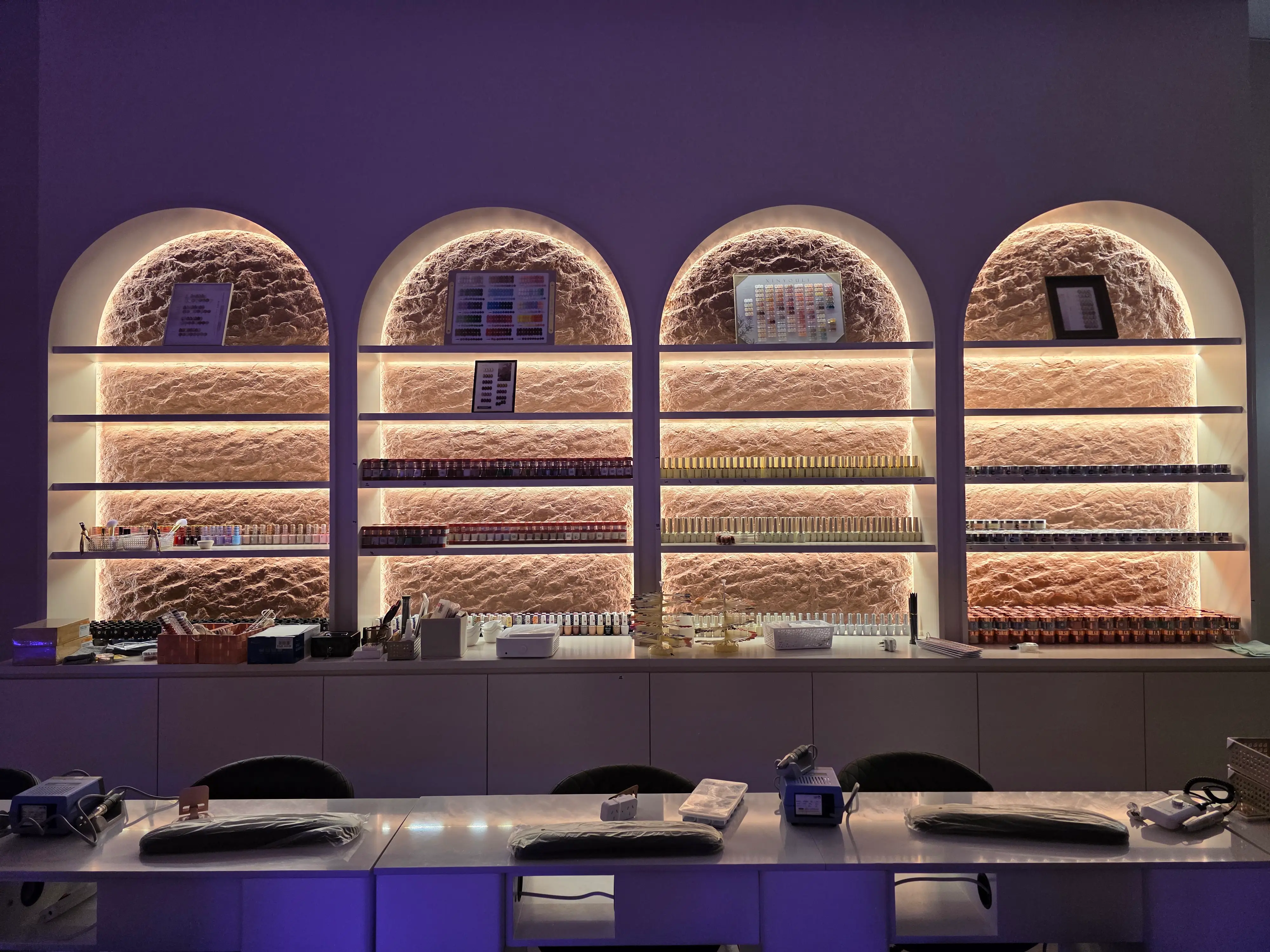 Illuminated brand wall and reception joinery.