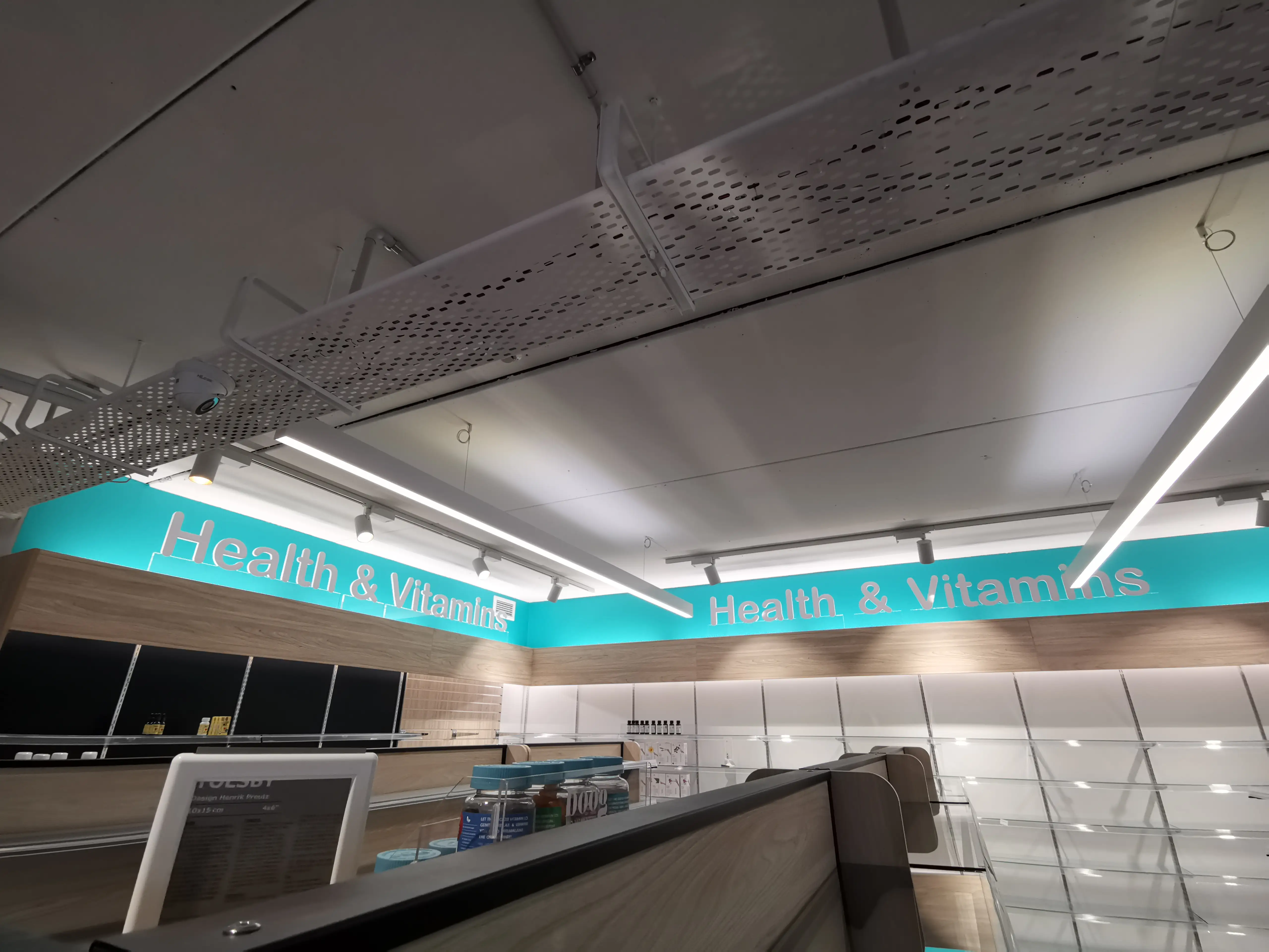 In-store aisle and directional signage.