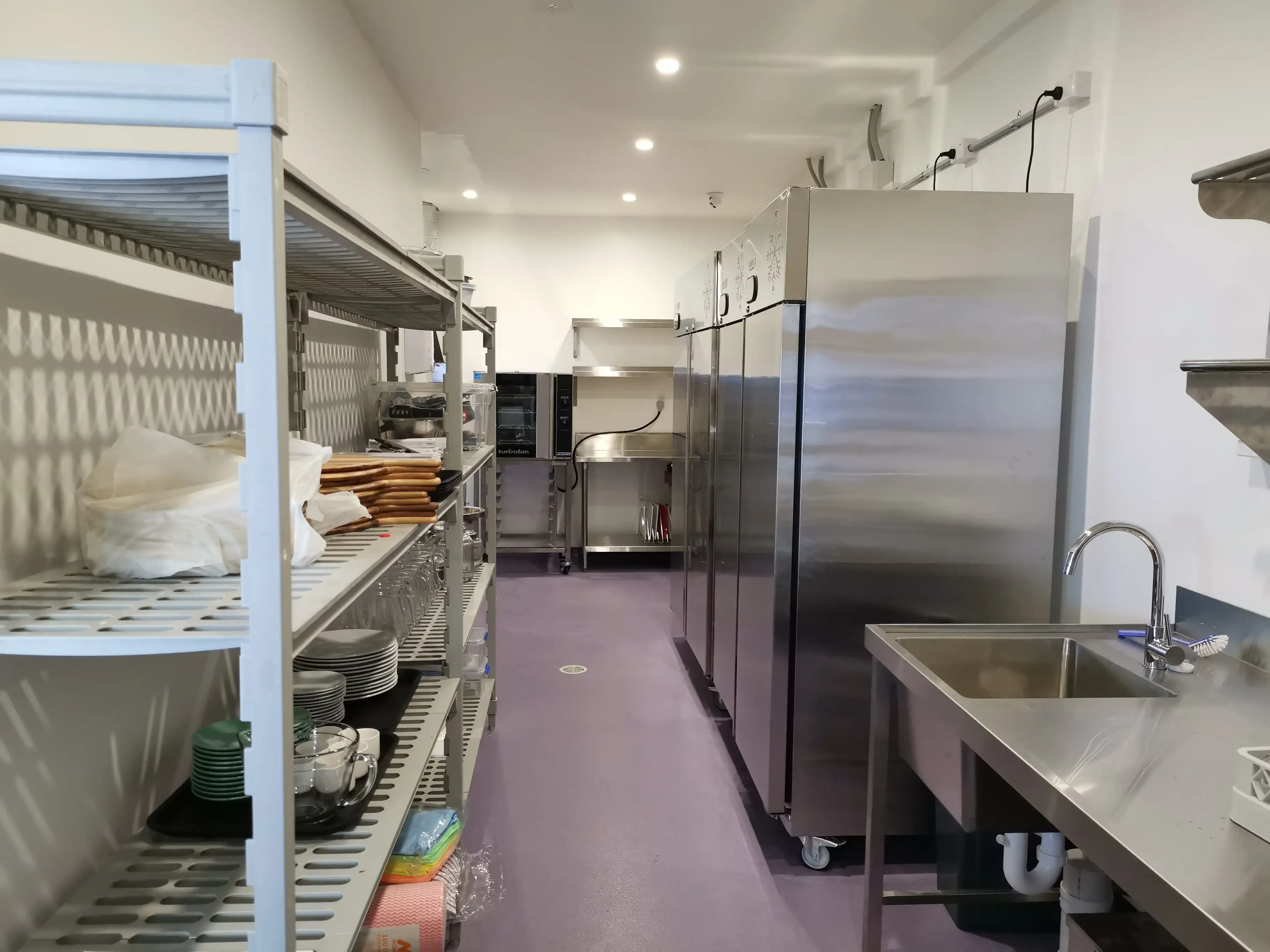 Commercial kitchen and back-of-house equipment supporting the family entertainment venue.