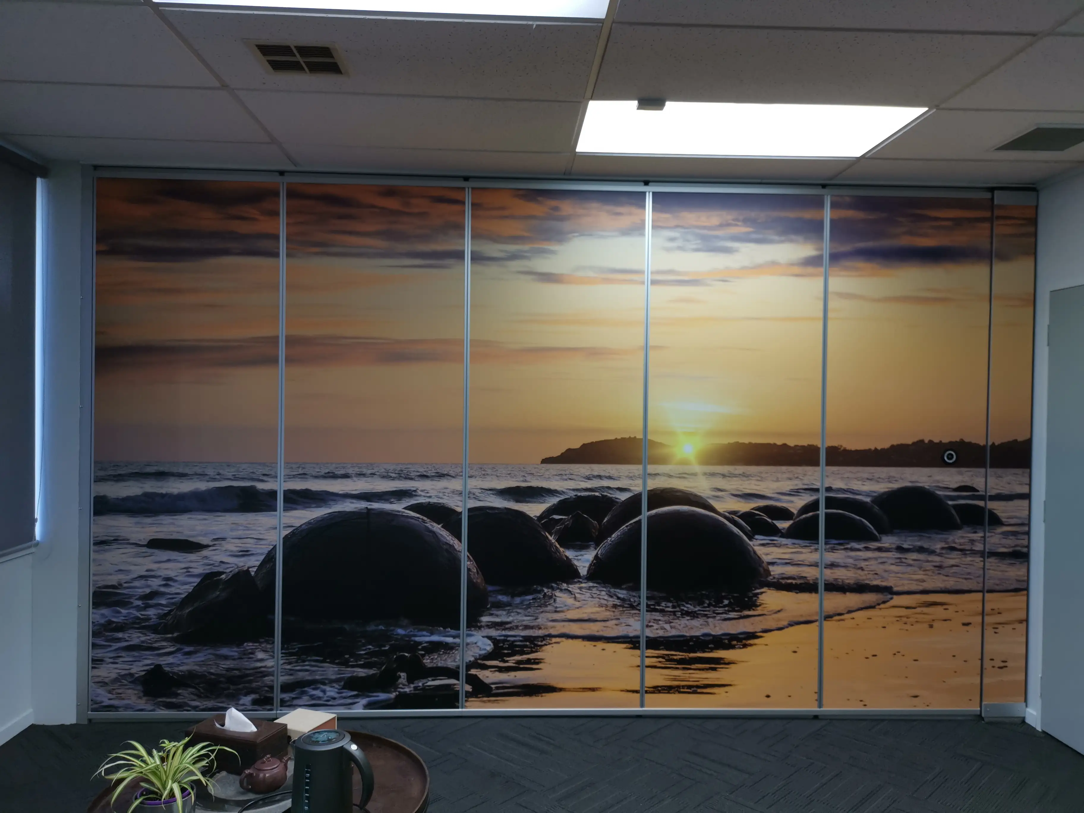 Glazed office partitions and interior identity details.