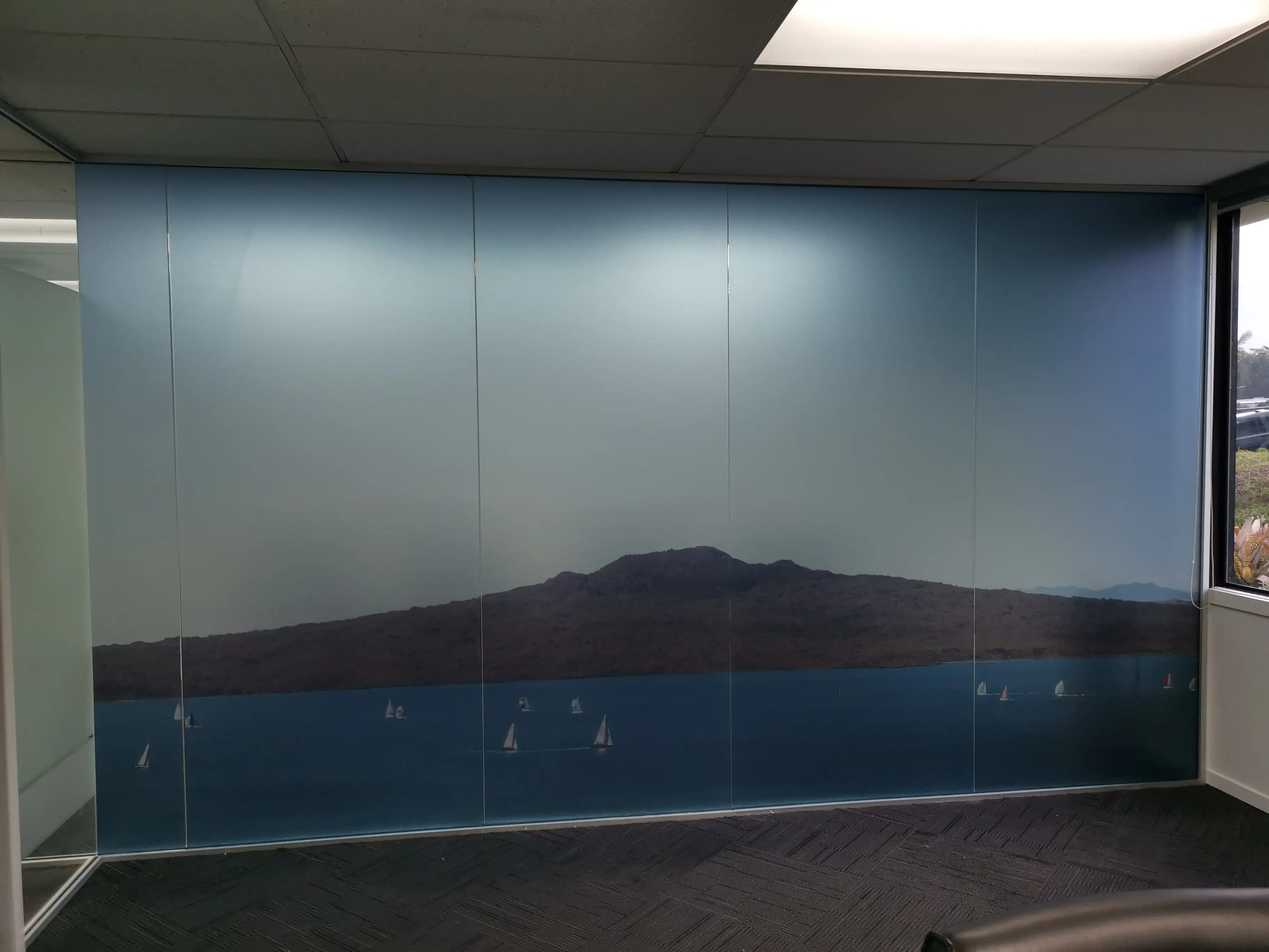 Graphic wall treatment within the completed workplace.