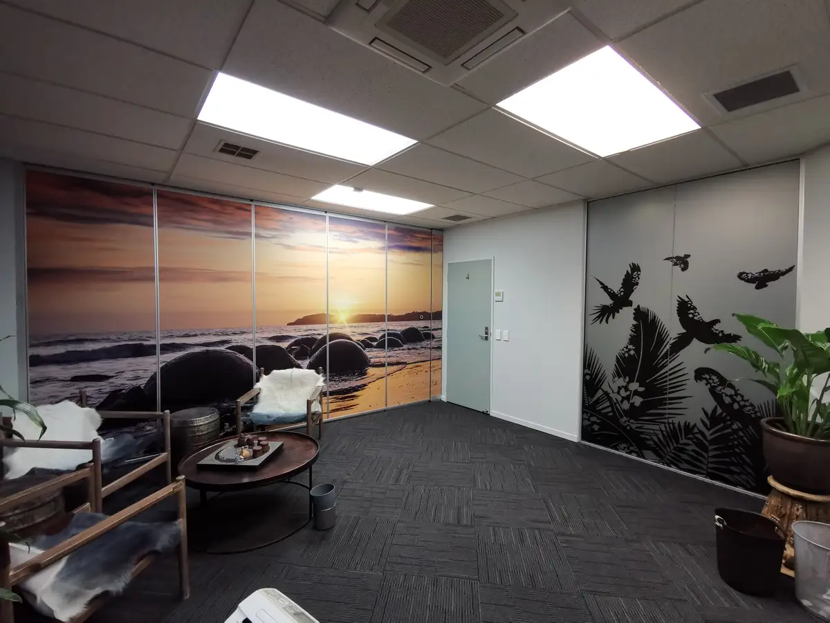 Glazed office partitions and interior identity details.