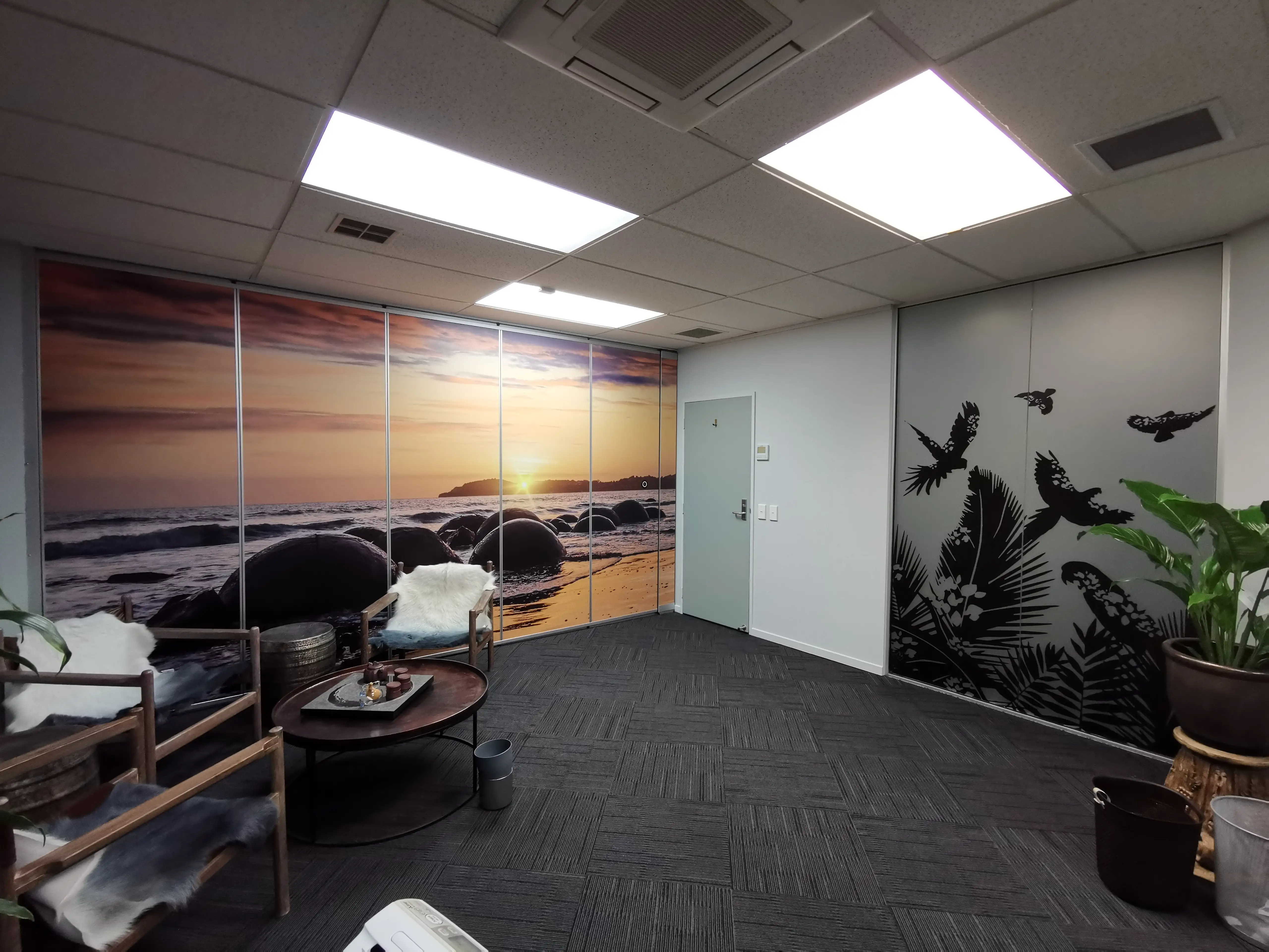 Glazed office partitions and interior identity details.