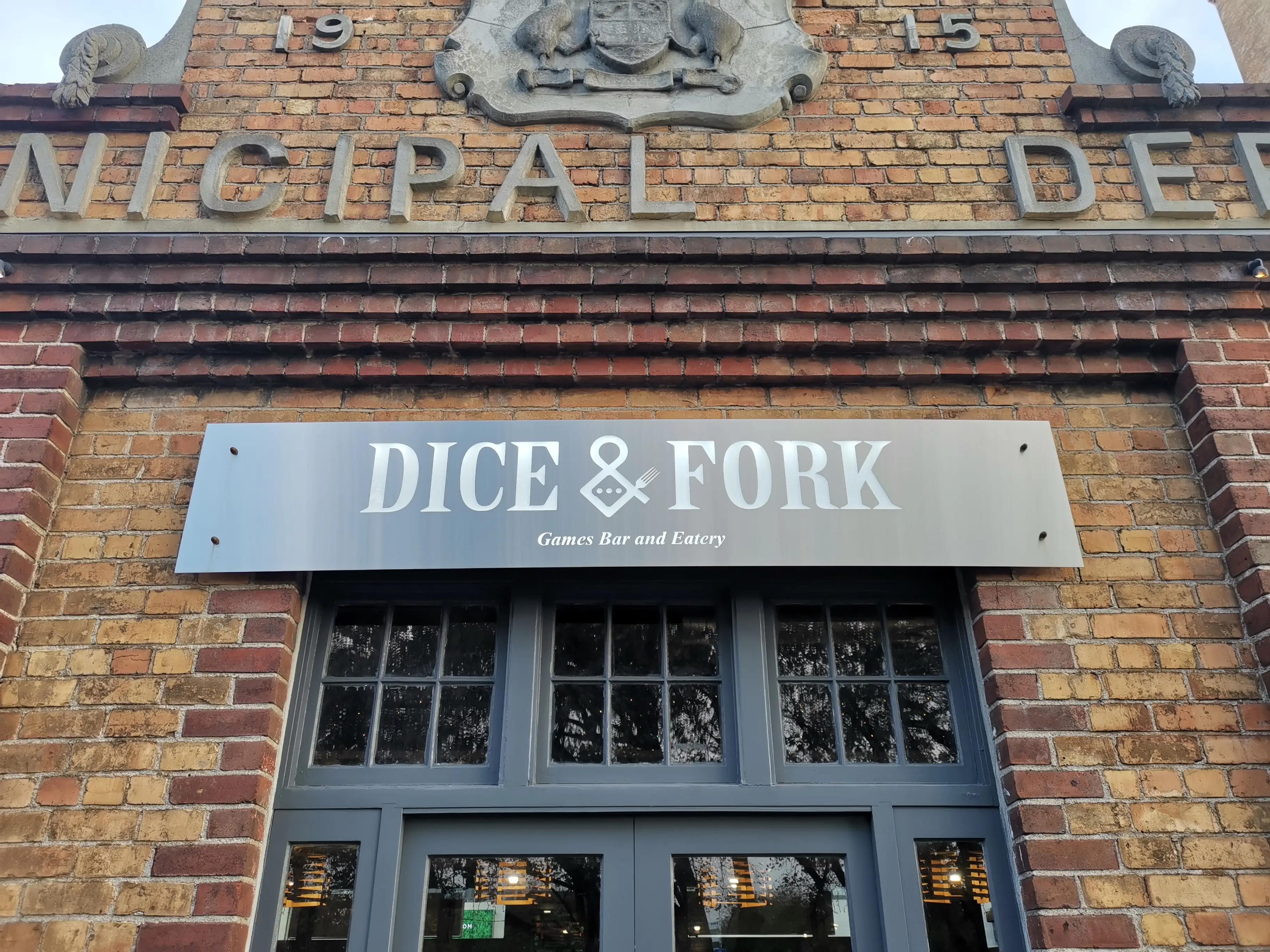 Illuminated Dice & Fork wall sign.