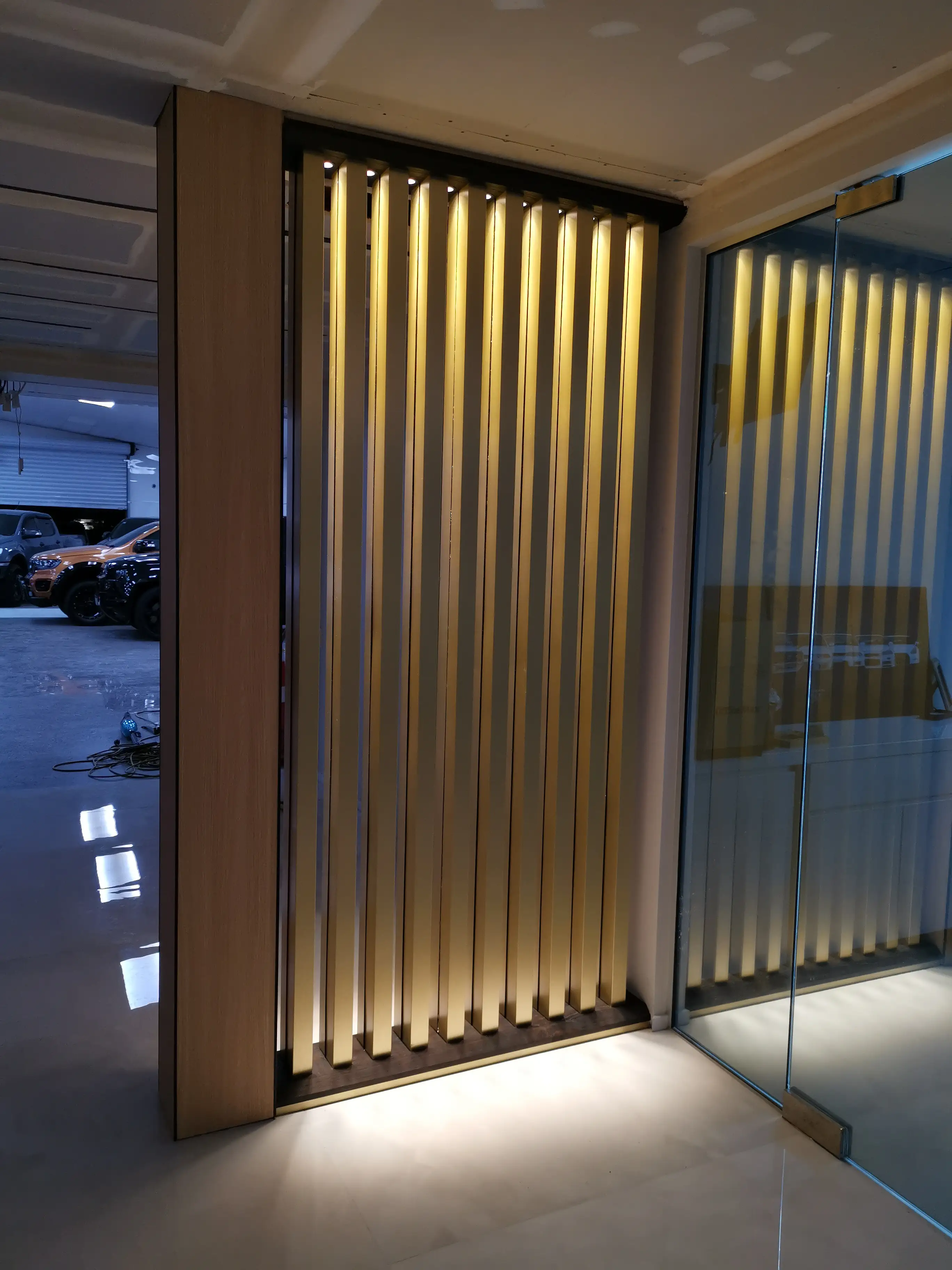 Completed automotive retail interior and circulation space.