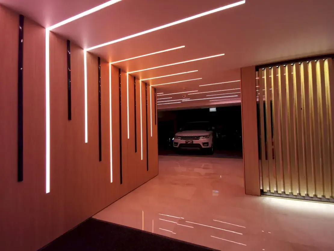 Completed feature-lit arrival corridor for AZAK Cars